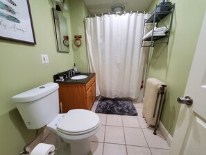 Combined shower/bathtub, hair dryer, towels, soap