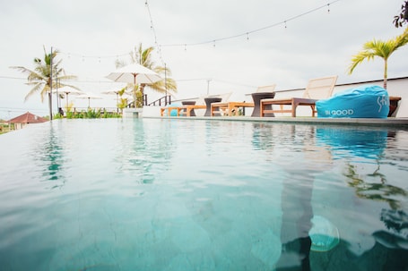 Outdoor pool, open 9:00 AM to 7:00 PM, sun loungers