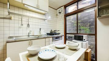 Private Vacation Home | Private kitchen | Fridge, microwave, electric kettle, cookware/dishes/utensils