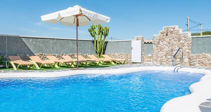 Air-Conditioned Apartment Close to the Beach with Pool, Terrace, Garden & Wi-Fi
