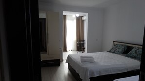 Standard Triple Room | Iron/ironing board (on request), WiFi (free), bed sheets - Gulnasi's Guesthouse (Batumi)