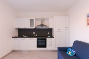 Fridge, oven, stovetop, highchair