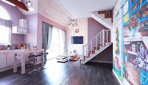 Haengbok | Área de sala de estar | Televisión de pantalla plana y piso con calefacción 