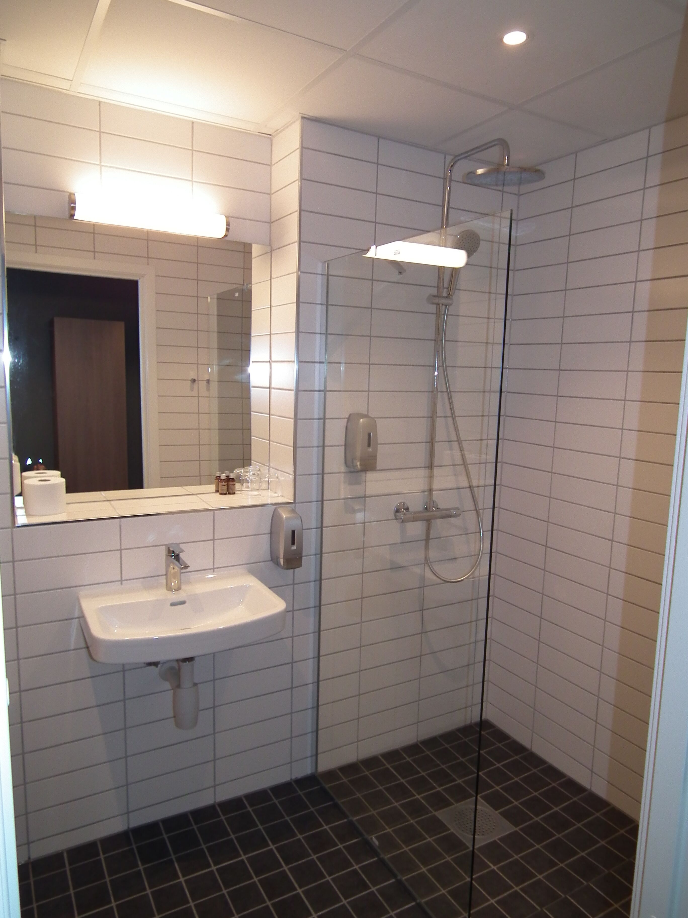 free toiletries, hair dryer, heated floors, towels