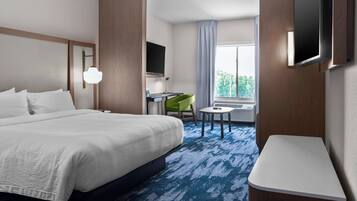 Desk, laptop workspace, blackout drapes, iron/ironing board