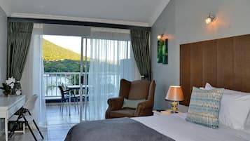 Luxury Room (Upstairs) | In-room safe, desk, laptop workspace, blackout drapes