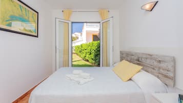 2 dormitorios, tabla de planchar con plancha, wifi gratis y ropa de cama