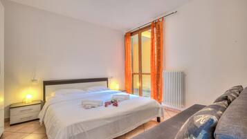 Family Apartment, 1 Bedroom, Mountainside (Va Pensiero sul lago Stunning View) | 1 bedroom, WiFi, bed sheets