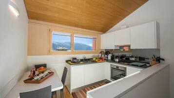 Family Townhome, Multiple Bedrooms, Mountainside (Ca' Melin) | Private kitchen | Full-sized fridge, microwave, oven, stovetop