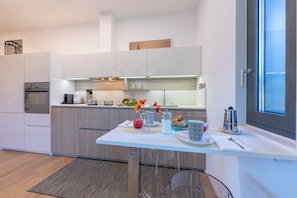 Family Apartment, 1 Bedroom, Air conditioning (Casa Basilico) | Private kitchen | Full-sized fridge, oven, stovetop, dishwasher