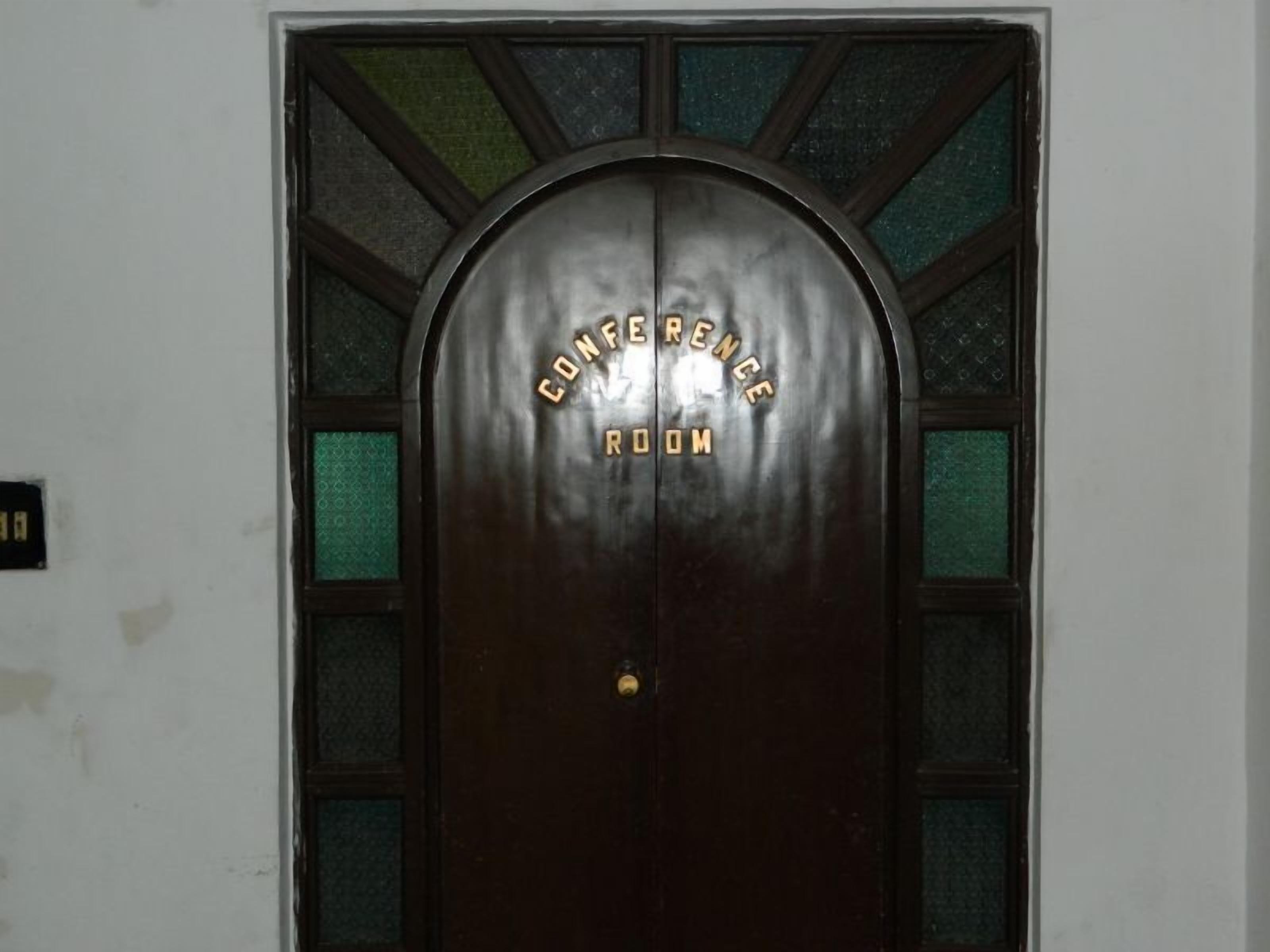A conference room door with the words "Conference Room" on it.