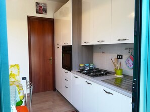 Fridge, oven, stovetop, highchair