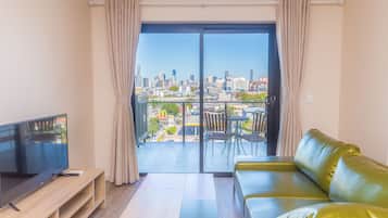 43-inch flat-screen TV with digital channels, TV, tablet