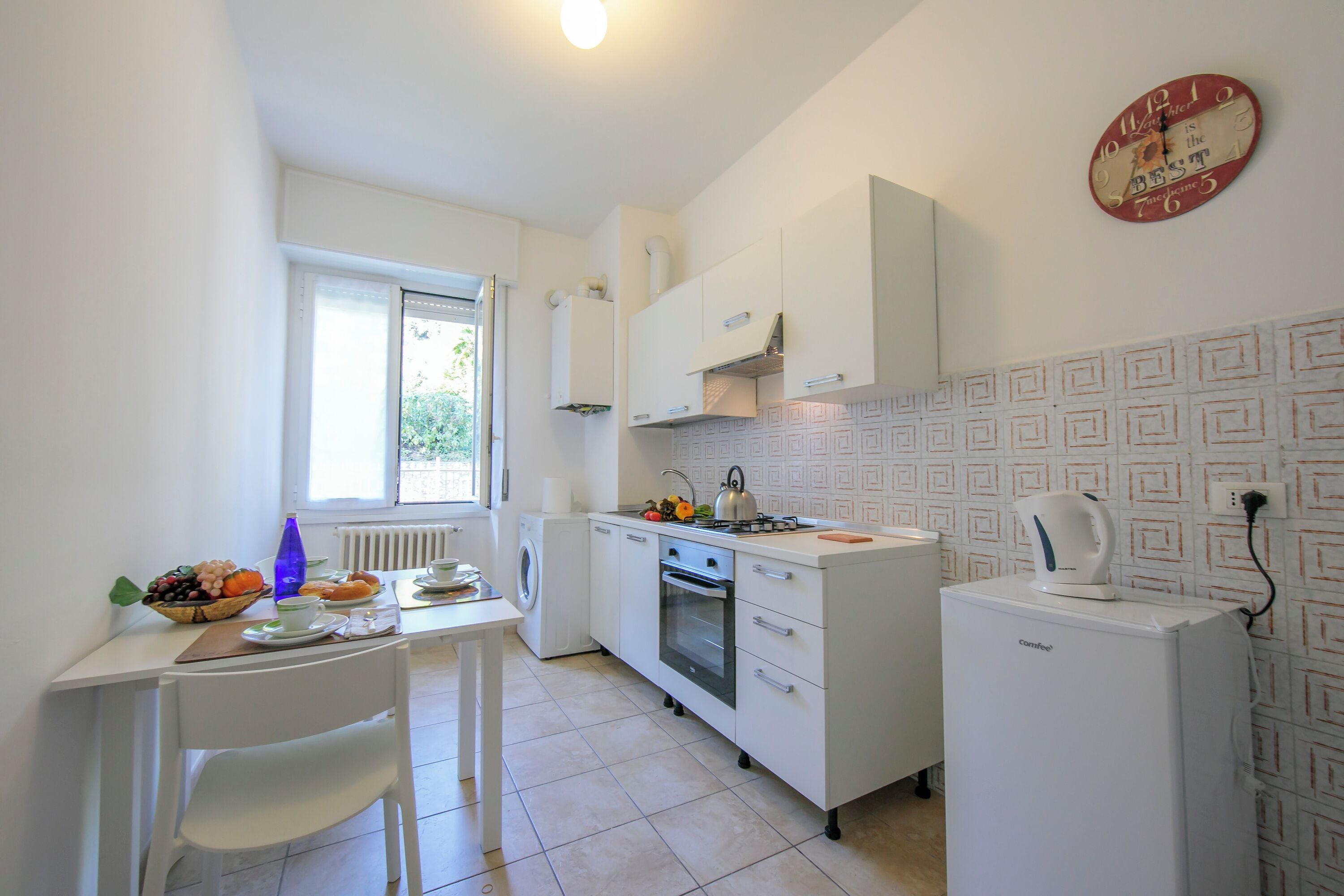 Family Apartment, Multiple Bedrooms (Casa Al Caprifoglio 600m From Beach) | Private kitchen | Fridge, microwave, oven, stovetop