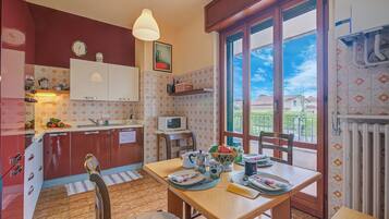 Family Apartment, 2 Bedrooms, 2 Bathrooms (Connie's apartment) | Private kitchen | Full-size fridge, microwave, oven, stovetop