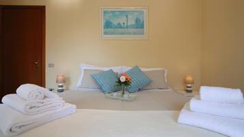 Family Apartment, 1 Bedroom (Petalo Bianco 100m from lake) | 1 bedroom, iron/ironing board, free WiFi, bed sheets