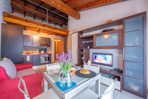 Family Apartment, 2 Bedrooms (Relax al Moro Apt with Pool) | Living room | 22-inch flat-screen TV with digital channels, TV - Relax al Moro Apt with Pool (Leggiuno)