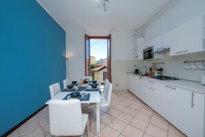 Family Apartment, Multiple Bedrooms, Lakeside (Residenza Oleandro Lake View Luino) | Private kitchen | Full-size fridge, microwave, stovetop, dishwasher