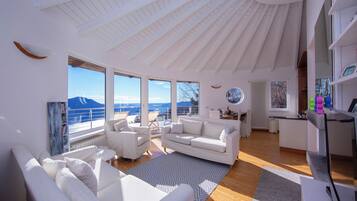 Honeymoon Apartment, Multiple Bedrooms, Mountainside (The Perfect View Loft) | Living area | 22-inch flat-screen TV with digital channels, TV, fireplace