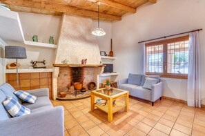 TV, fireplace - Finca 'Sa Caseta Son Morro' with Private Pool, Wi-Fi and Air Conditioning (Can Picafort)
