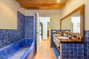 Bathtub, hair dryer, towels