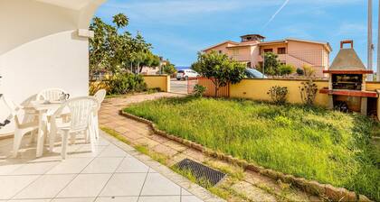 Charming Holiday Home Tanaunella appartamento 2 with Ventilators, Balcony, Terraces & Sea View; Parking Available, Pets Allowed
