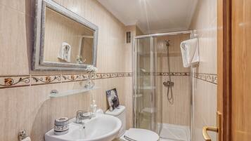 Bathtub, hair dryer, towels