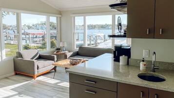 Winton Cottage | Living area | 50-inch Smart TV with cable channels, TV, heated floors