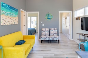 Auburn Cottage | Living area | 50-inch Smart TV with cable channels, TV, heated floors