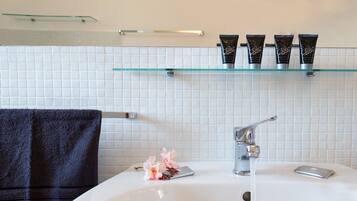 Shower, free toiletries, hair dryer, towels