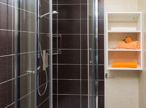 Villa (Four-Bedroom Villa with Terrace) | Bathroom | Shower, towels