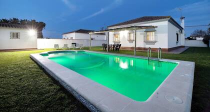 Holiday Home "Chalet Isla del Sotillo" a Short Drive from Beach with Pool & Large Garden