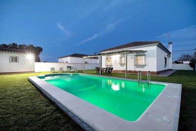 Holiday Home "Chalet Isla del Sotillo" a Short Drive from Beach with Pool & Large Garden
