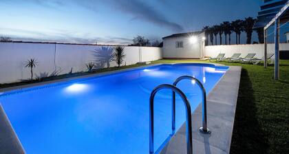 Holiday Home "Chalet Isla del Sotillo" a Short Drive from Beach with Pool & Large Garden