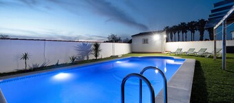 Holiday Home "Chalet Isla del Sotillo" a Short Drive from Beach with Pool & Large Garden