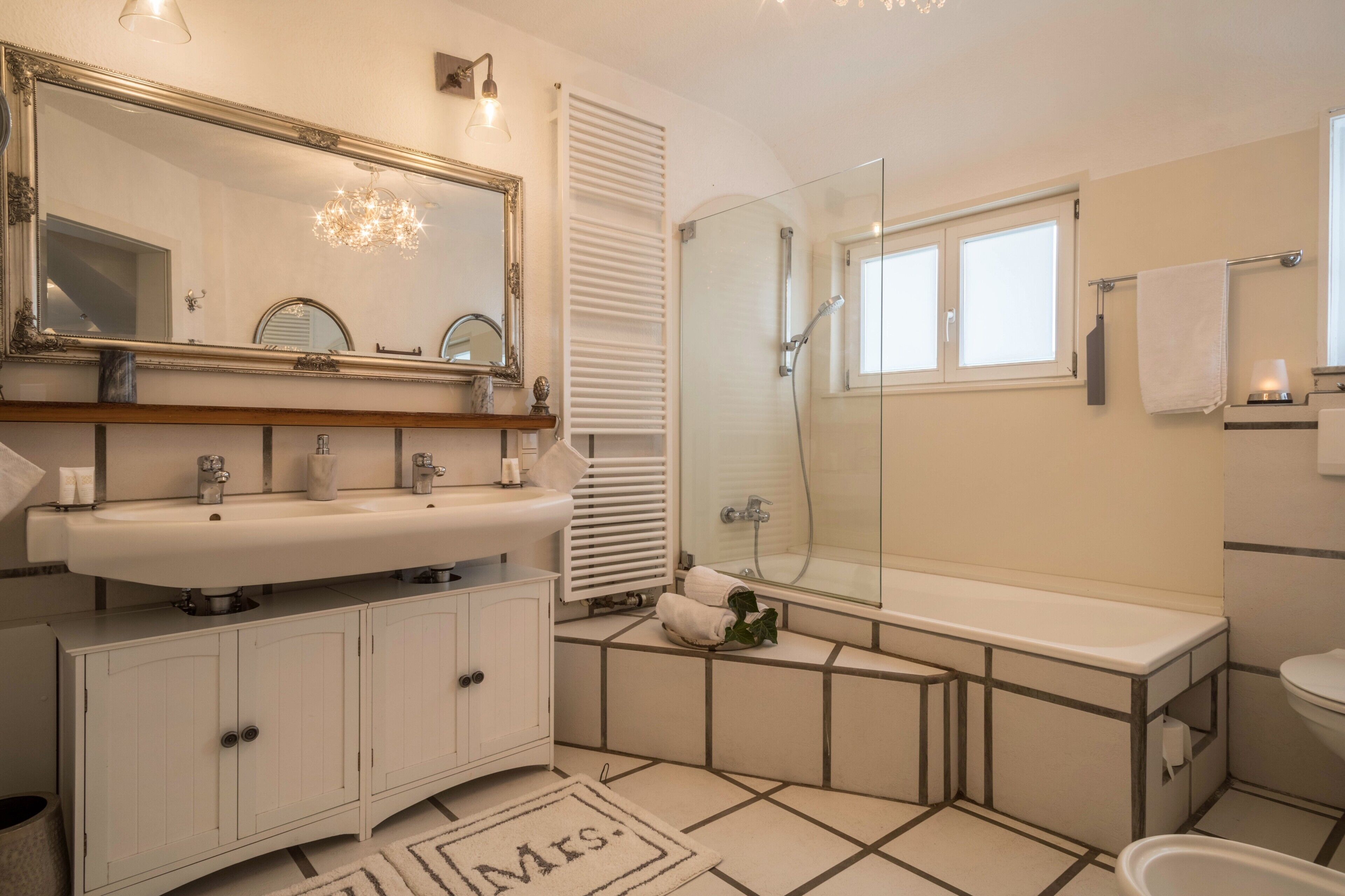 Bathtub, hair dryer, towels