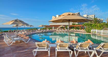 Cancun Jr Suite en resort vista al mar