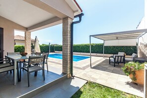 Outdoor dining - House Gortan with heated pool near Pula, Istria, Croatia (Marčana)