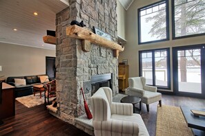 Smart TV, fireplace, books