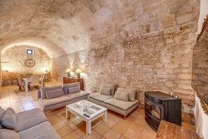 TV, fireplace - Mallorcan Country House with Wi-Fi, Pool, Terraces & Air Conditioning; Parking Available (Llucmajor)