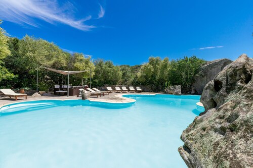 Sardinian-Style Studio with Garden, Terrace, and Shared Pool