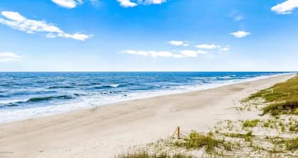 Comfortable, bright and sunny beach house. Steps away from beach access.