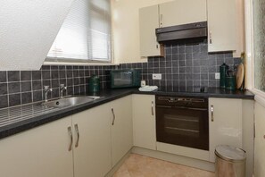 Fridge, microwave, oven, stovetop - Two bedroom apartment, (Hunstanton,)