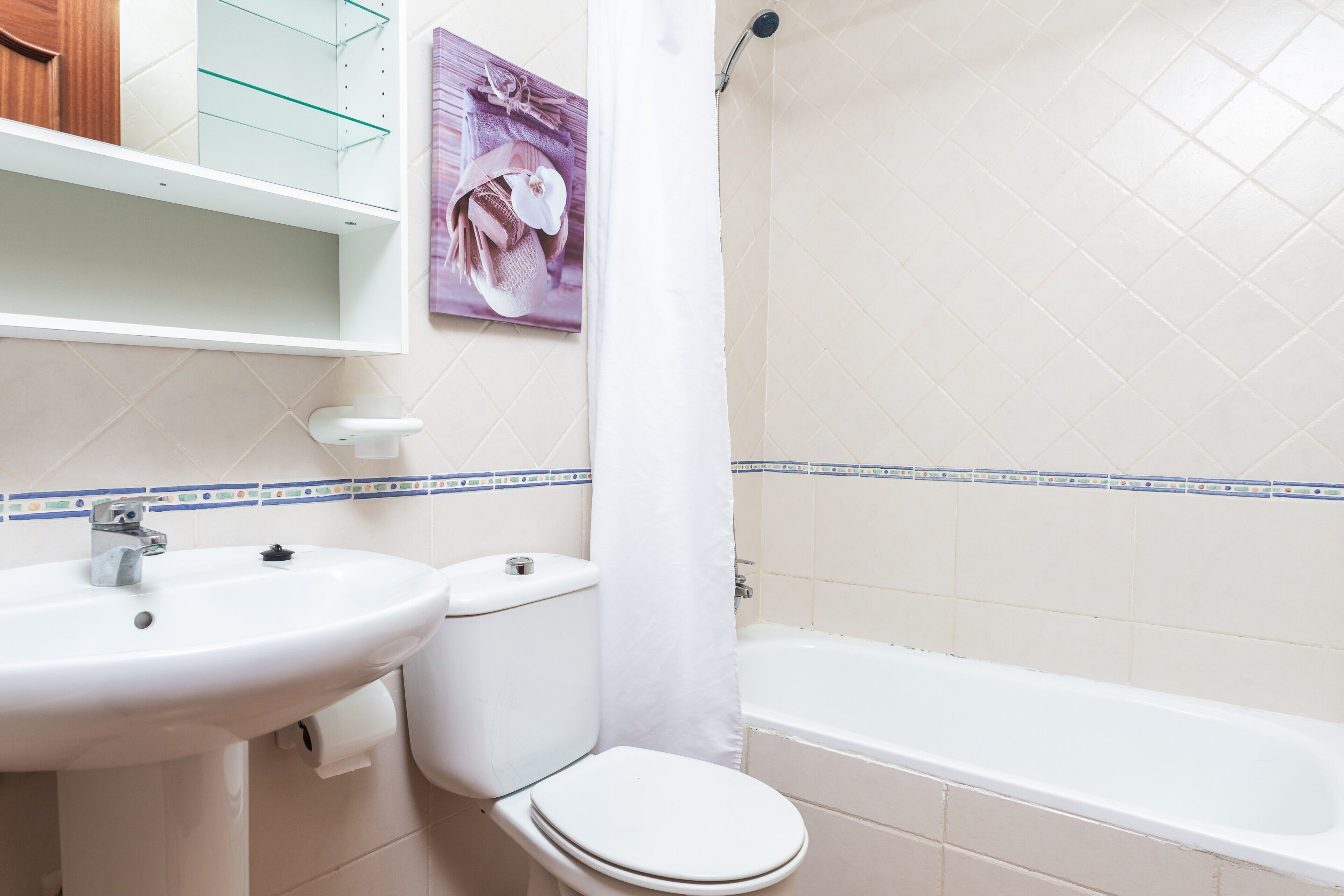 Badekar, hårføner og håndklær