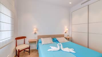 2 dormitorios, tabla de planchar con plancha, wifi gratis y ropa de cama