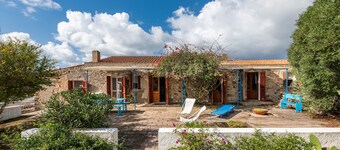 Maison de vacances de charme "Dimora tipica Carlofortina" avec vue sur la mer et les montagnes