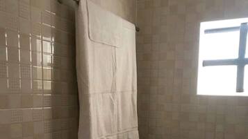 Shower, rainfall showerhead, towels