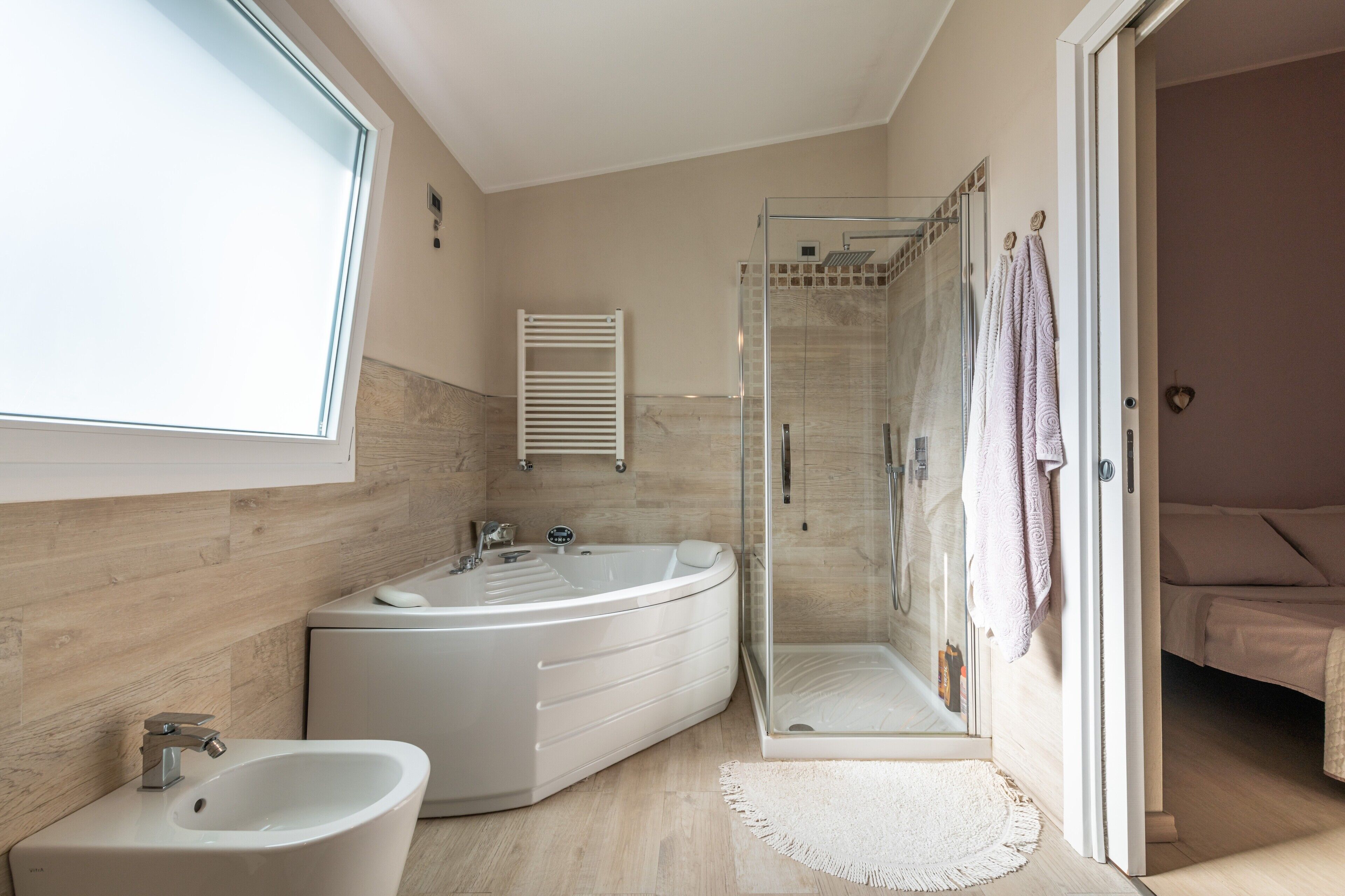Bathtub, hair dryer, towels