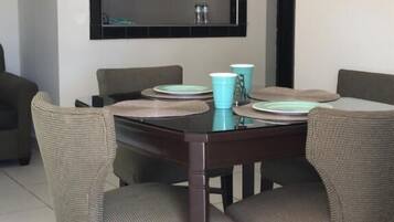 Standard Suite, Kitchenette | Living room | 33-inch LCD TV with cable channels, TV