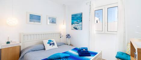 2 slaapkamers, een strijkplank/strijkijzer, gratis wifi, beddengoed